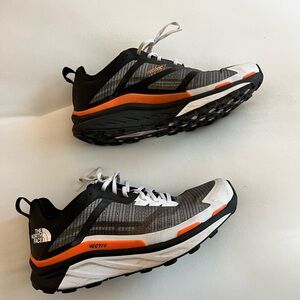 The North Face Men’s Black, Gray and White Athletic Sneakers with Orange Accents